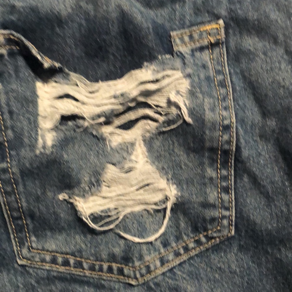 Woman’s distressed high rise button fly Jean shorts - Picture 8 of 9